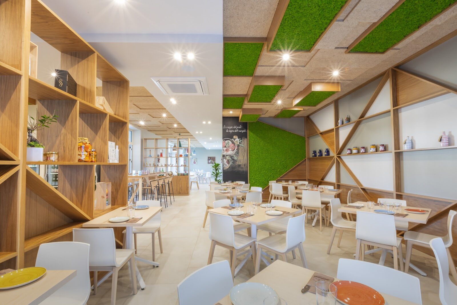 The dining room with the moss wall