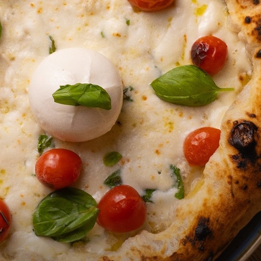 Pizza with burratina and Manduria tomato