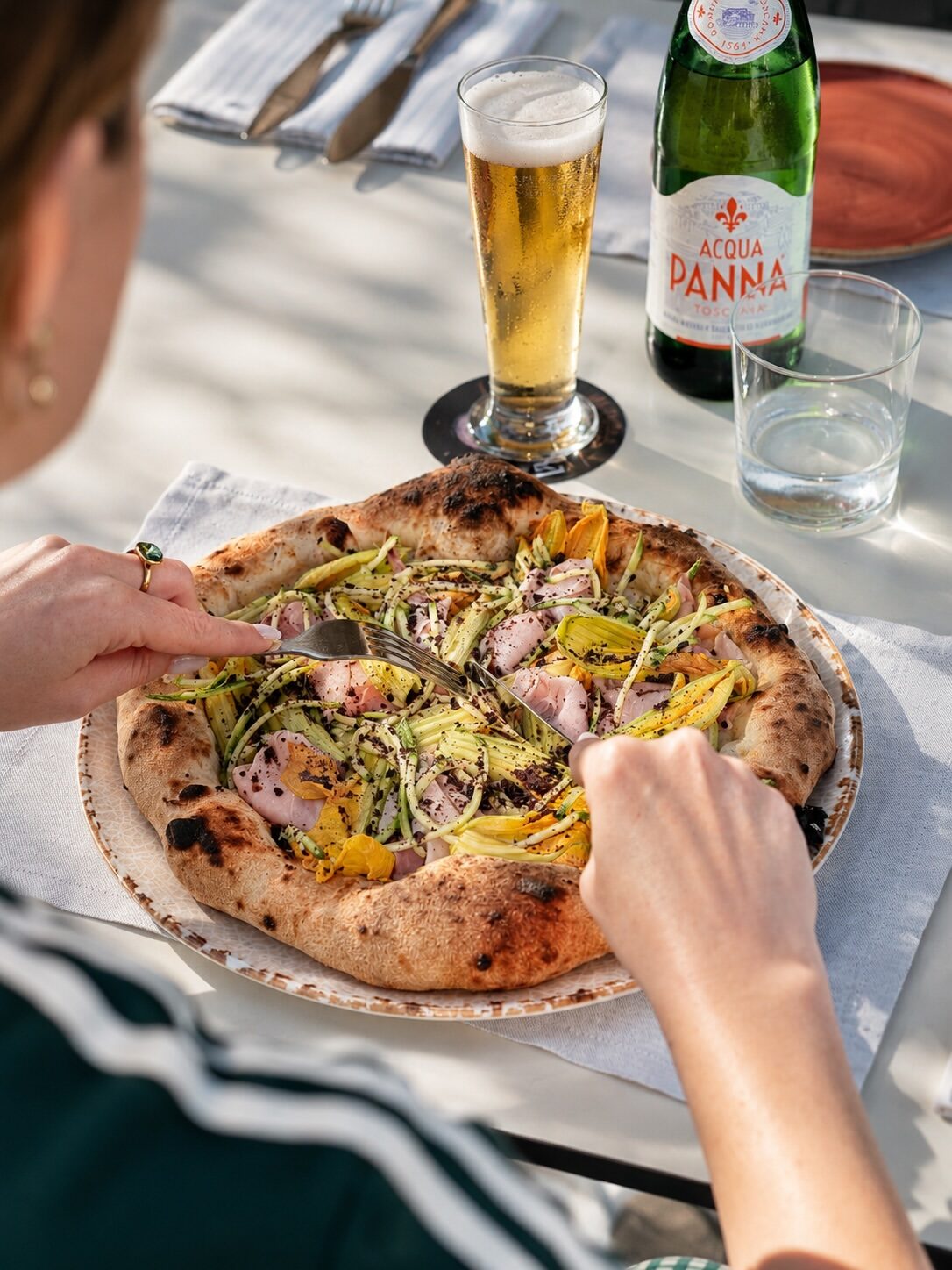 Pizza and beer at the table